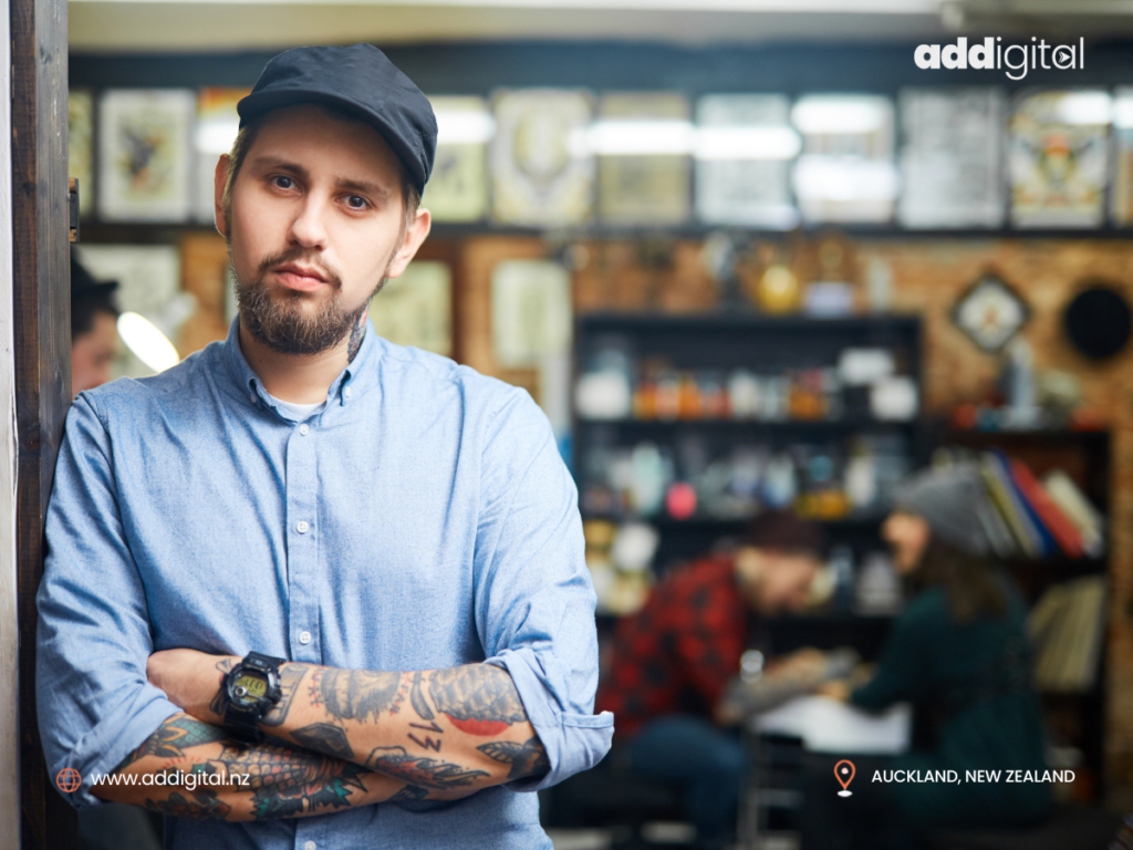 New business owner standing inside a recently acquired café, highlighting the importance of protecting a business's digital presence during the first 90 days after purchase.